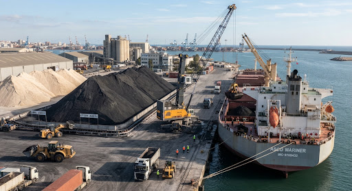 Dry bulk cargo operations management including coal and clinker unloading